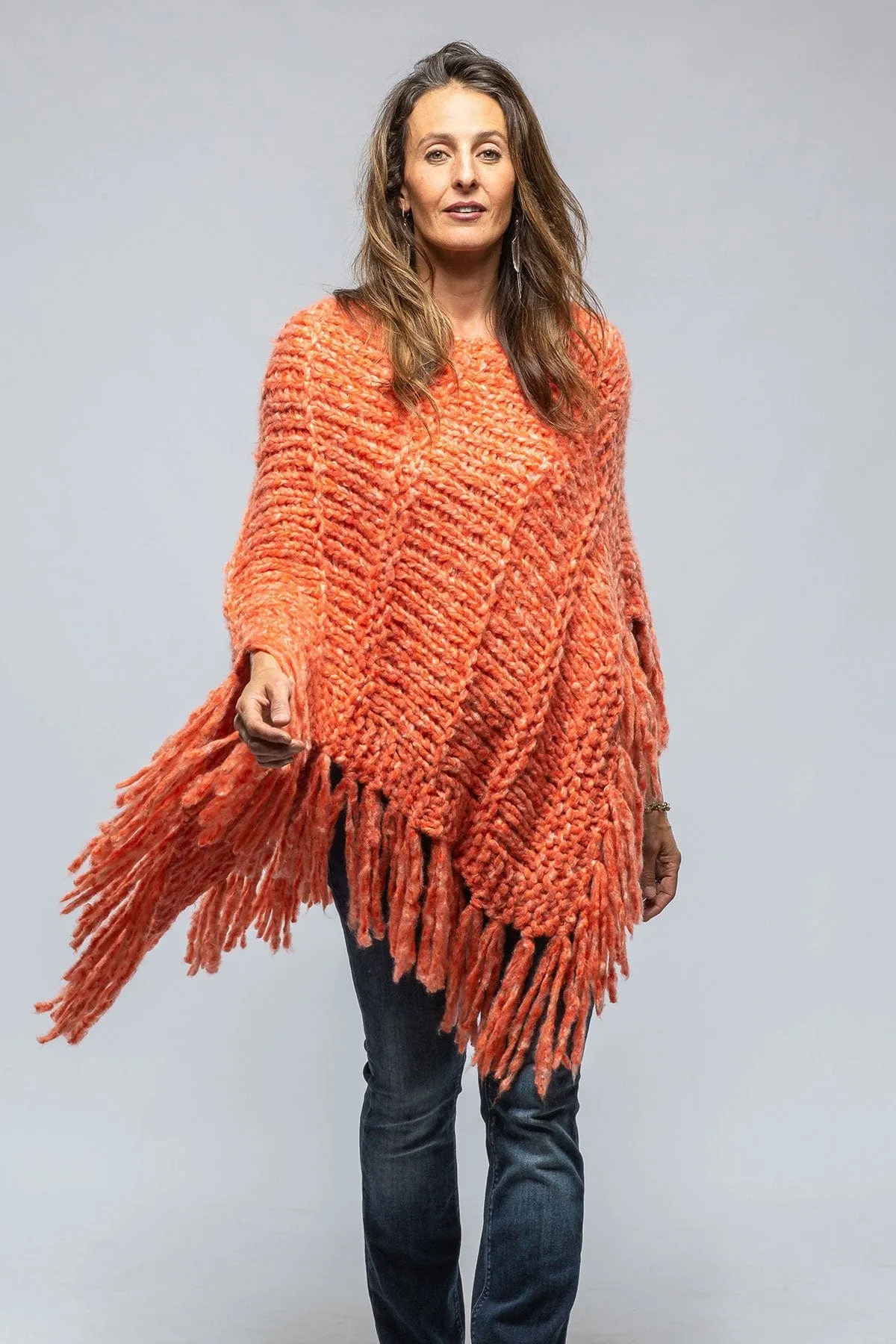 Soliana Cashmere Poncho In Melon Flame