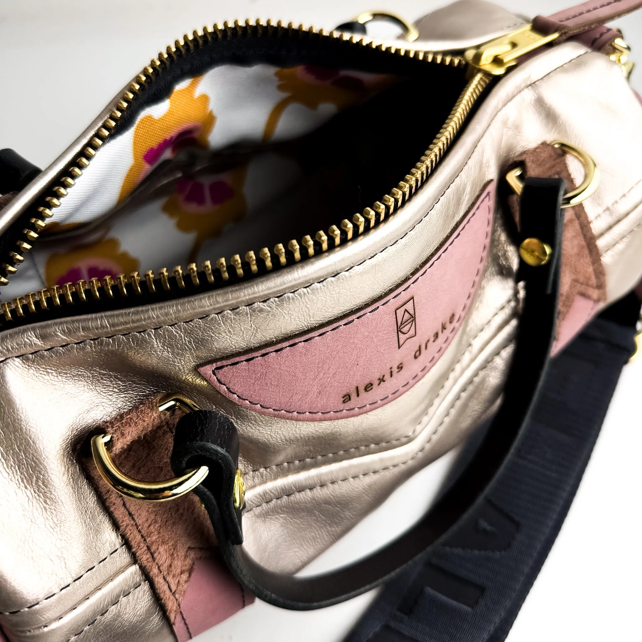 Urban Edge Collection | Gigi Baby Duffel   Crossbody | Distressed Pink Jade   Champagne Steel